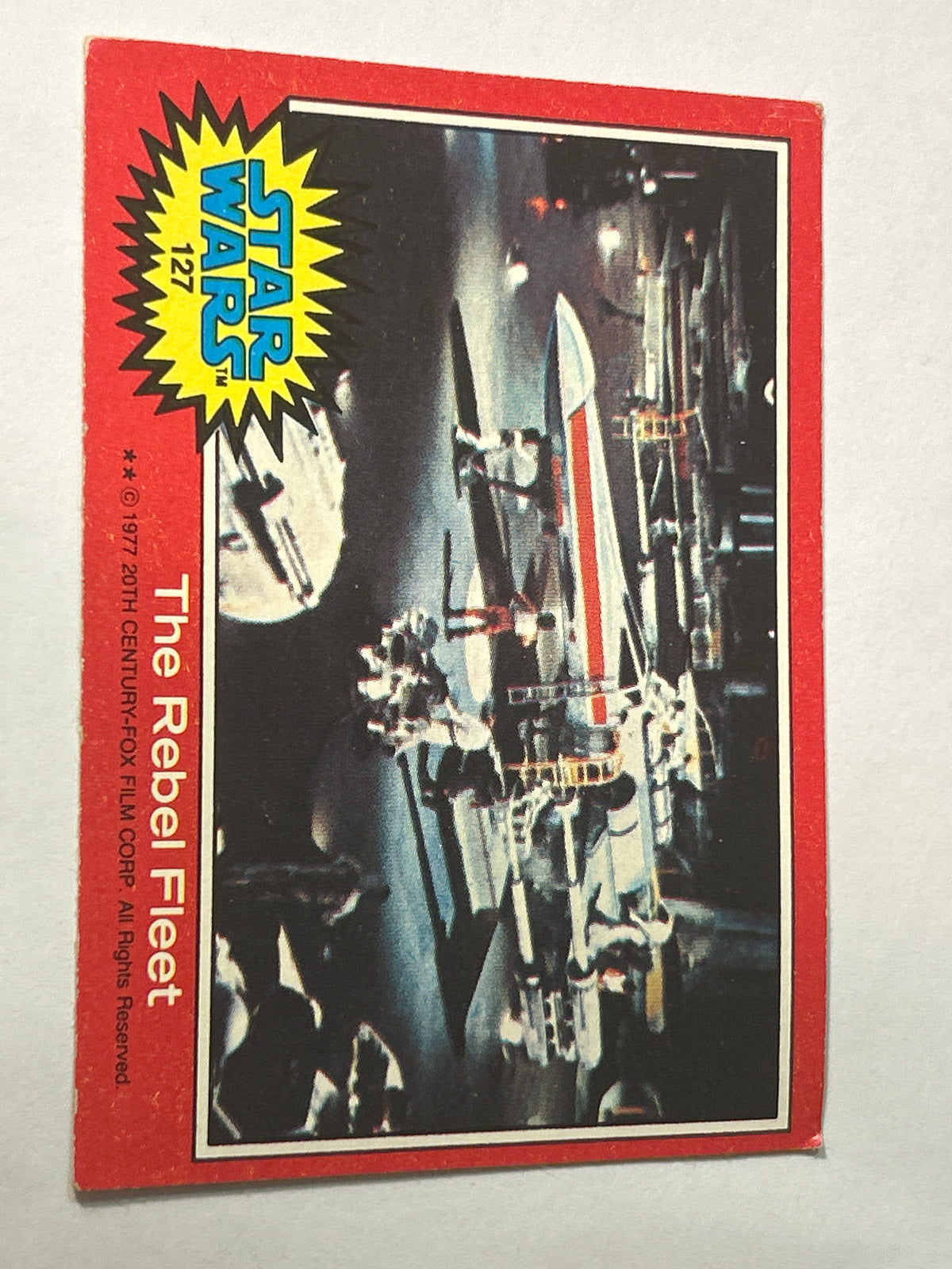 1977 Topps Star Wars Series 2 Red #127 The Rebel Fleet (Chewbacca Actor's Profile Back)