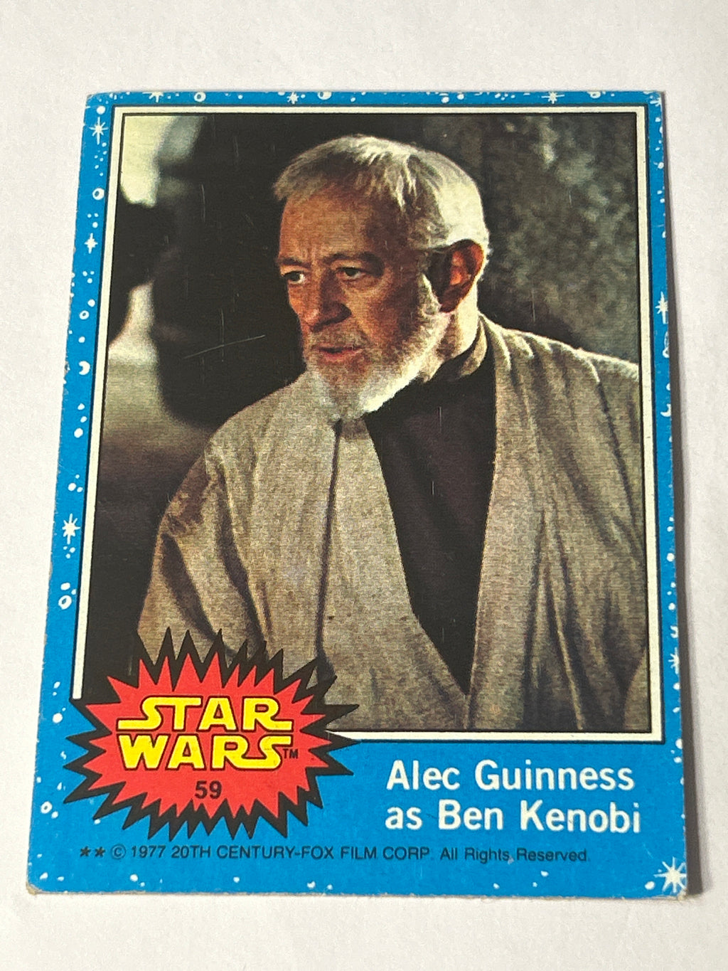 1977 Topps Star Wars Series 1 Blue #59 Alec Guinness as Ben Kenobi (Puzzle Back)