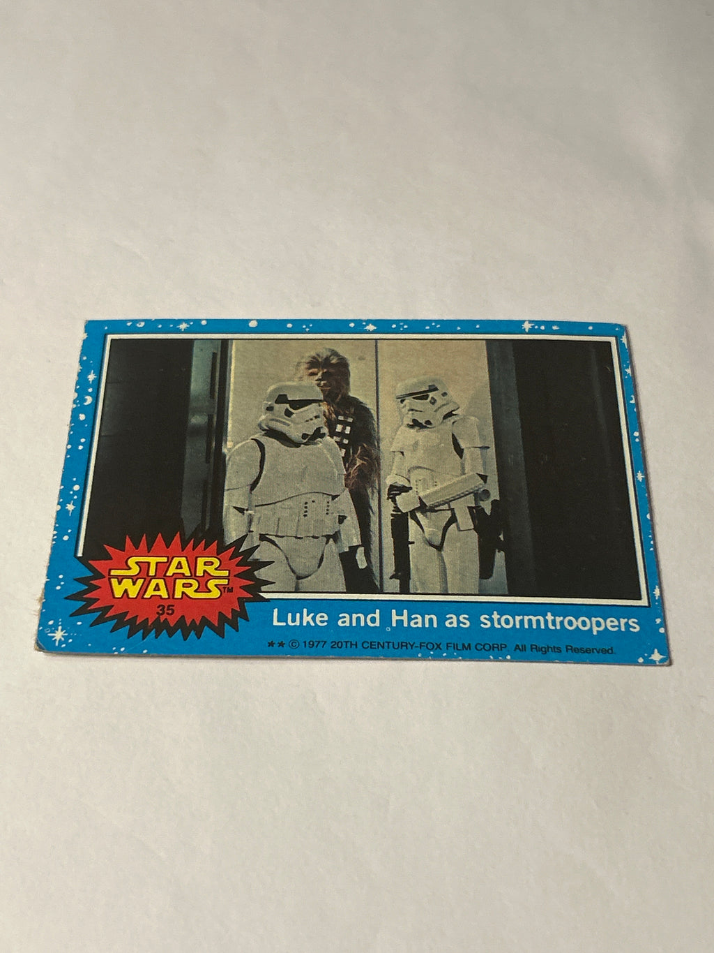 1977 Topps Star Wars Series 1 Blue #35 Luke and Han as Stormtroopers (Movie Facts Back)