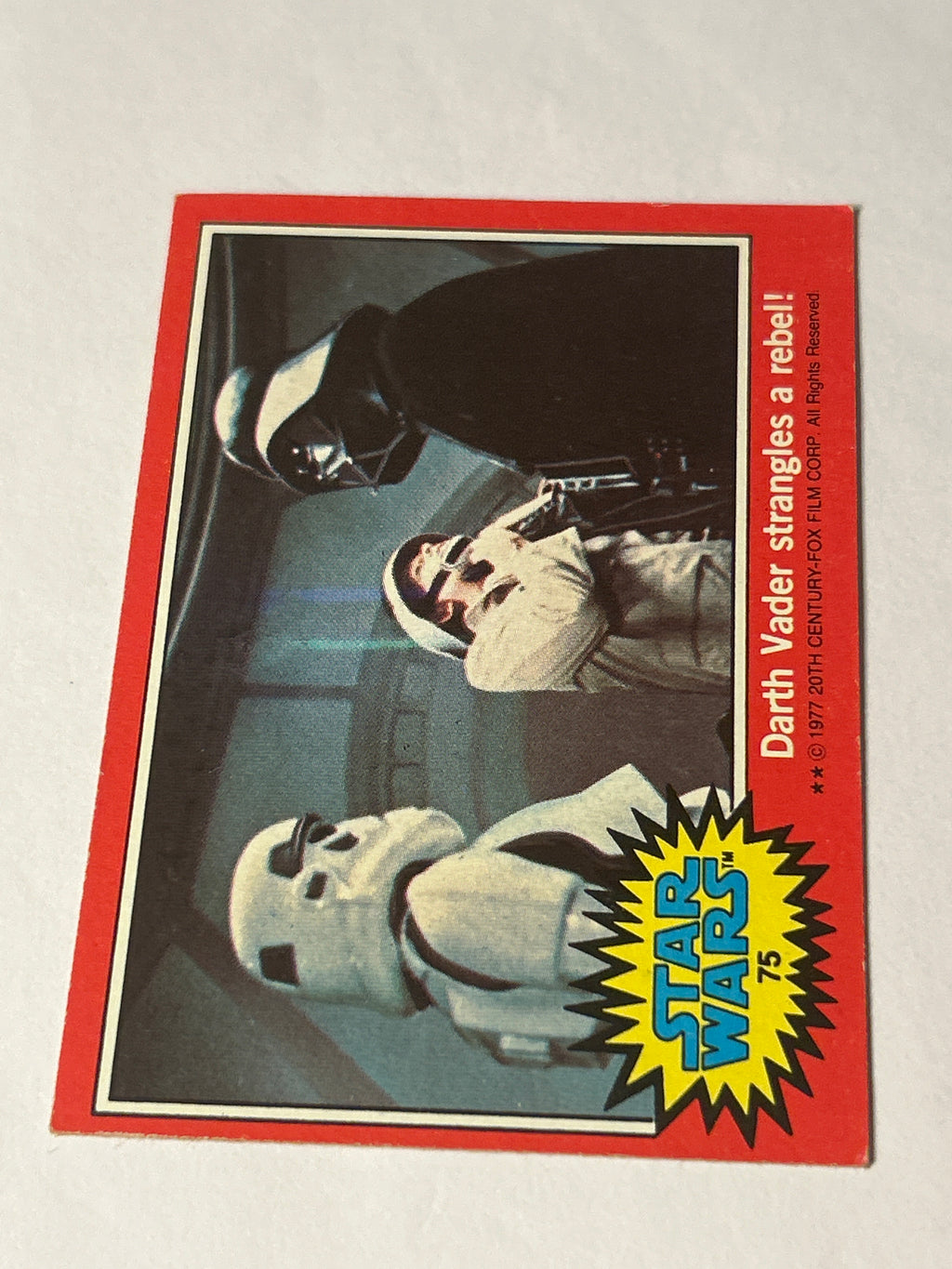 1977 Topps Star Wars Series 2 Red #75 Darth Vader Strangles a Rebel! (Movie Facts Back)