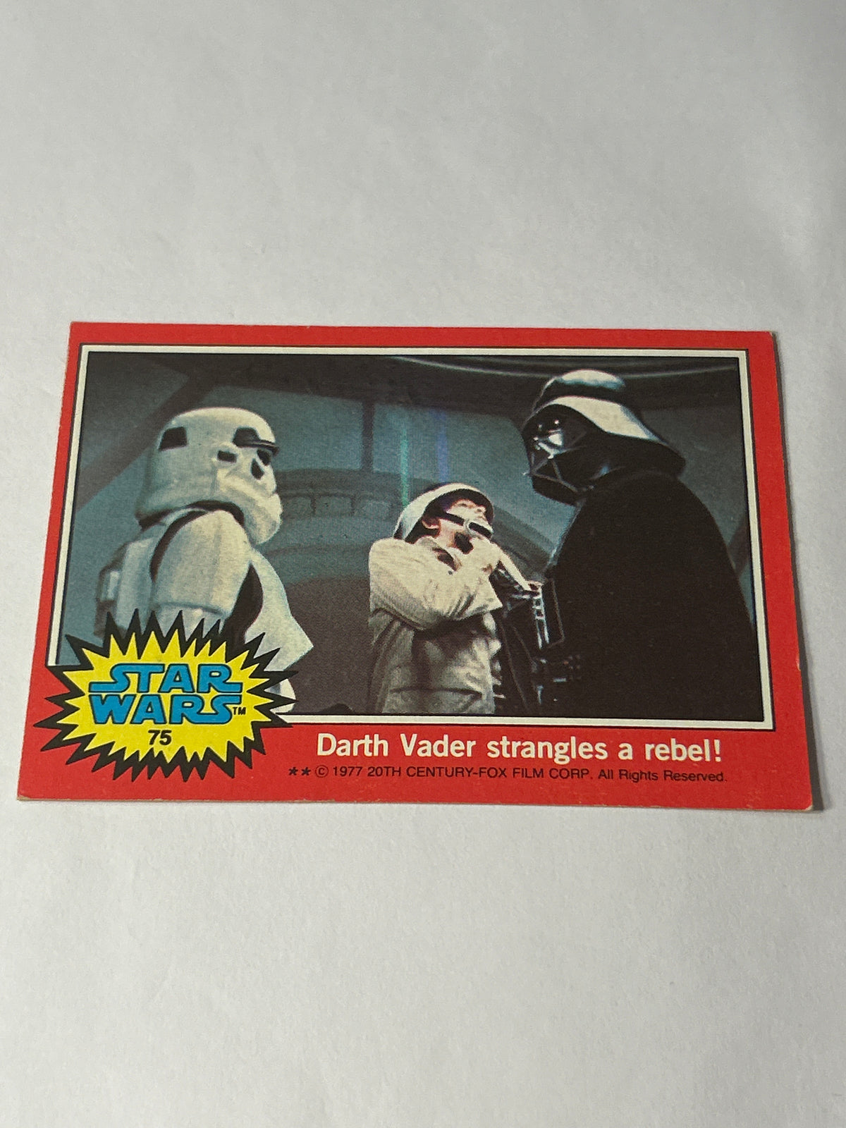 1977 Topps Star Wars Series 2 Red #75 Darth Vader Strangles a Rebel! (Movie Facts Back)