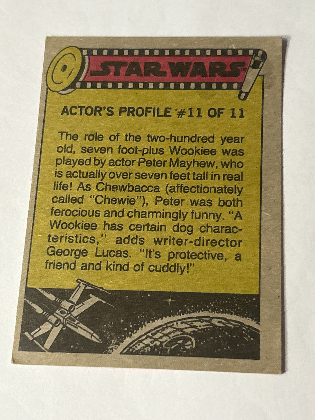 1977 Topps Star Wars Series 2 Red #127 The Rebel Fleet (Chewbacca Actor's Profile Back)